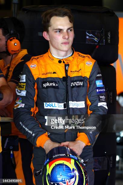 Oscar Piastri of Australia and McLaren looks on in the garage during Formula 1 testing at Yas Marina Circuit on November 22, 2022 in Abu Dhabi,...