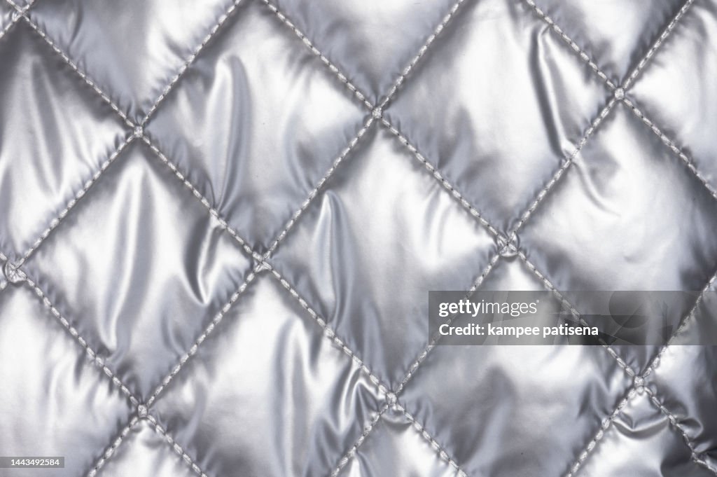 Quilted cloth, Full frame shot of sivler fabric.