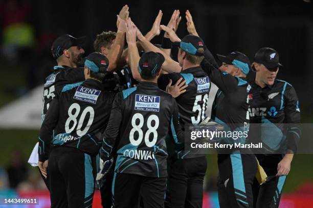 New Zealand players celebrate a wicket during game three of the T20 International series between New Zealand and India at McLean Park on November 22,...