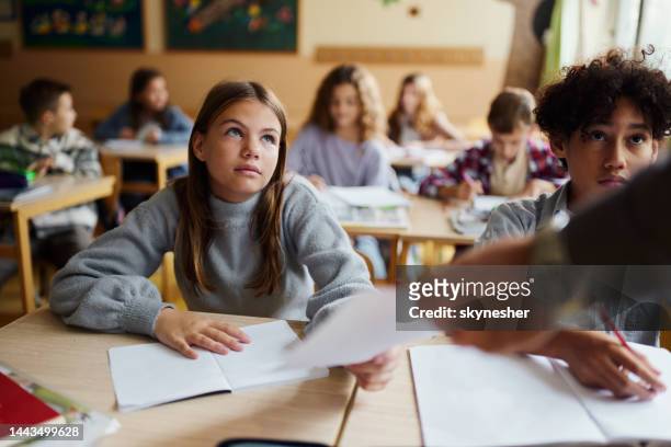 receiving bad test results in school! - bad kids classroom stockfoto's en -beelden
