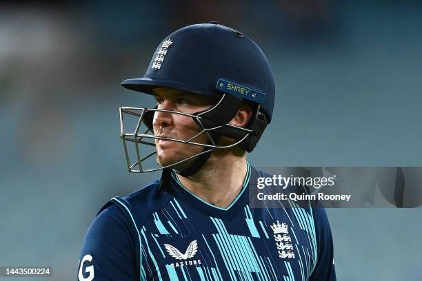 Jason Roy of England walks off the field after being dismissed by Pat Cummins of Australia during game three of the One Day International series...