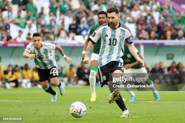Lionel Messi of Argentina scores their team's first goal via a penalty during the FIFA World Cup Qatar 2022 Group C match between Argentina and Saudi...