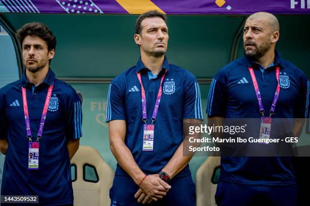 Head coach Lionel Scaloni of Argentina reacts with his assistant coaches Walter Samuel and Pablo Aimar during the FIFA World Cup Qatar 2022 Group C...