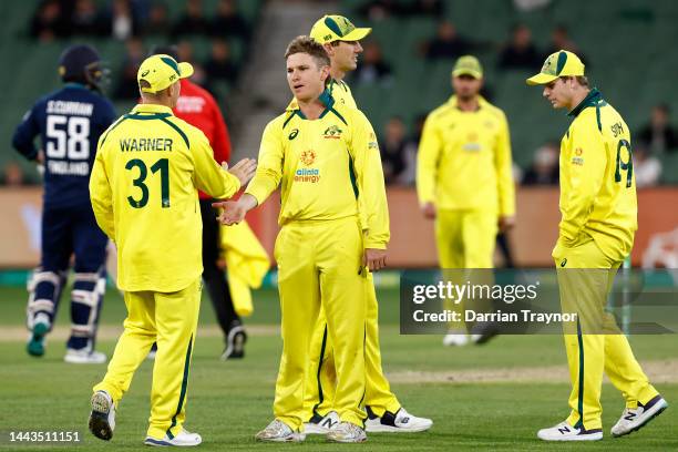 Adam Zampa of Australia celebrates the wicket of Moeen Ali of England during game three of the One Day International series between Australia and...