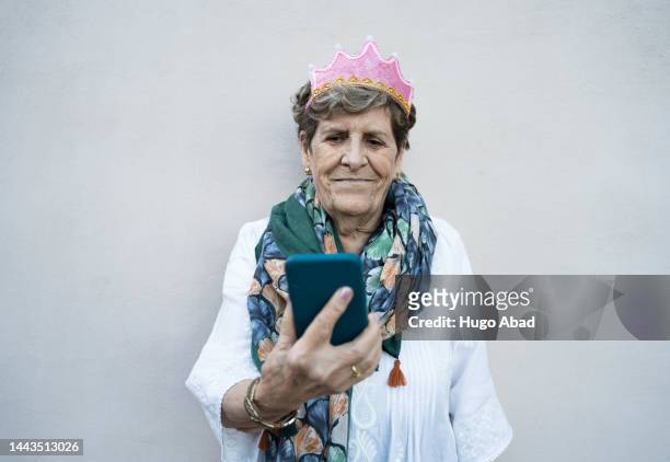 grandmother celebrating her birthday. - fashionable grandma stock pictures, royalty-free photos & images