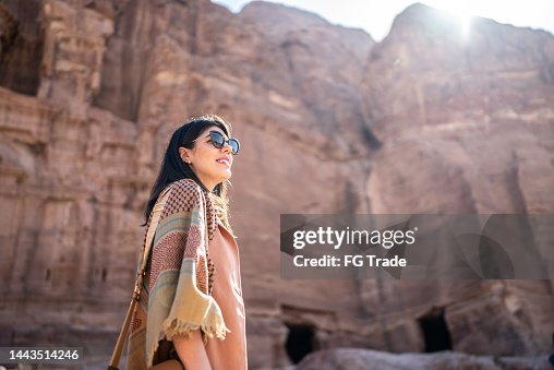 Mid adult woman tourist admiring Petra, Jordan