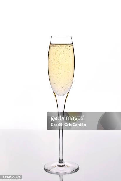 champagne glass - champagne flute white background stock pictures, royalty-free photos & images