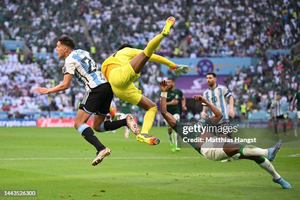 Mohammed Al-Owais of Saudi Arabia collides with teammate Yasser Al-Shahrani during the FIFA World Cup Qatar 2022 Group C match between Argentina and...