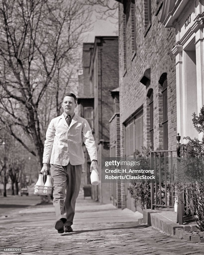 1940s Milkman Walking Up Street