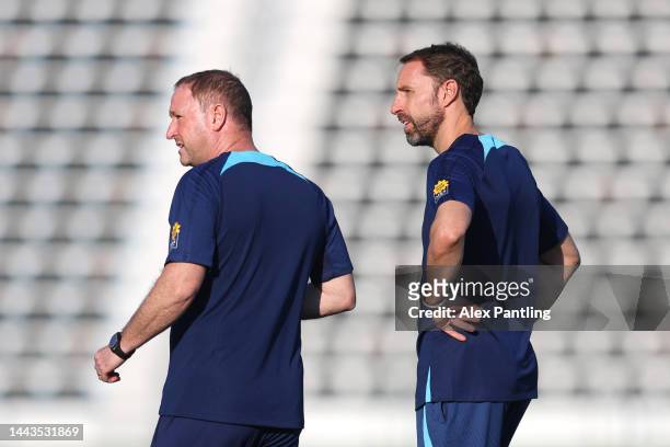 Gareth Southgate , Head Coach of England, looks on with Steve Holland, Assistant Coach of England during the England Training Session at Al Wakrah...