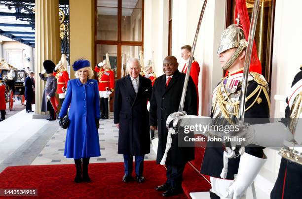 Camilla, Queen Consort, King Charles III and South African President, Cyril Ramaphosa arrive at the Grand Entrance of Buckingham Palace during a...