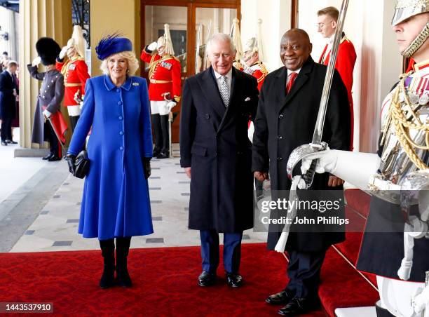 Camilla, Queen Consort, King Charles III and South African President, Cyril Ramaphosa arrive at the Grand Entrance of Buckingham Palace during a...