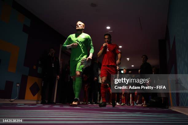 Kasper Schmeichel and Joachim Andersen of Denmark lead their team out the tunnel prior to the FIFA World Cup Qatar 2022 Group D match between Denmark...