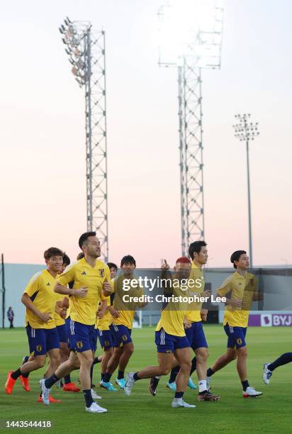 Players of Japan warm up during the Japan Training Session at Al Sadd New Training Facilities on November 22, 2022 in Doha, Qatar.