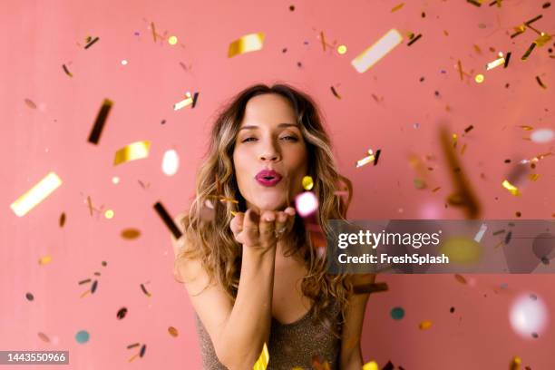 it's time to celebrate: a portrait of a happy beautiful elegant - mandar um beijo imagens e fotografias de stock