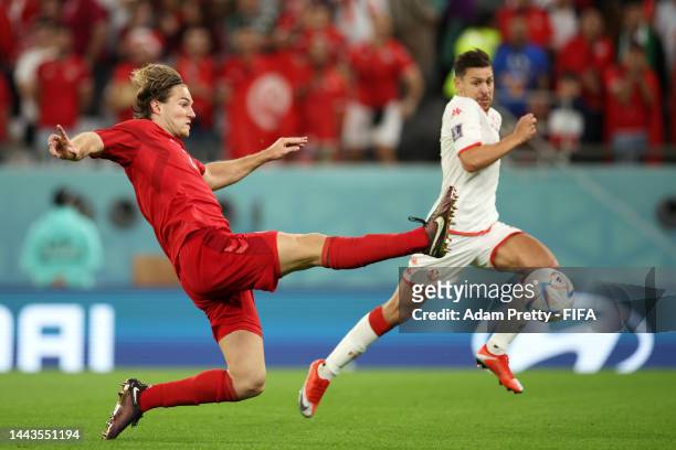 Joachim Andersen of Denmark stretches for the ball during the FIFA World Cup Qatar 2022 Group D match between Denmark and Tunisia at Education City...