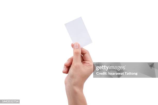 hand holding paper isolated on white background - business card template stock pictures, royalty-free photos & images