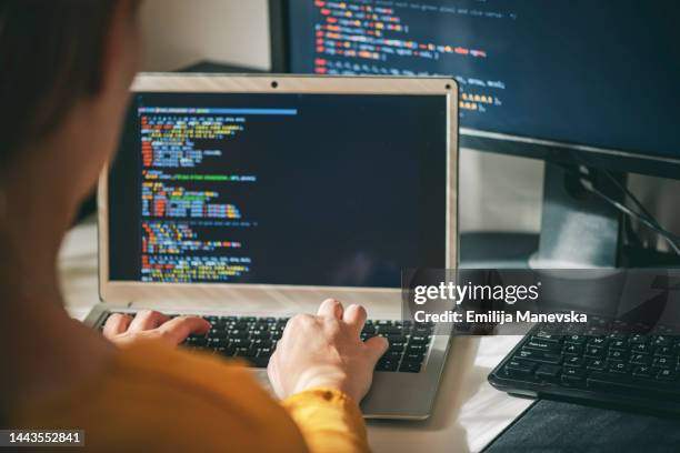 close up of woman programmer working at home in his home office - developer stockfoto's en -beelden