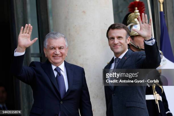 French President Emmanuel Macron welcomes Uzbekistan's President Shavkat Mirziyoyev at the Elysee Palace on November 22, 2022 in Paris, France. The...