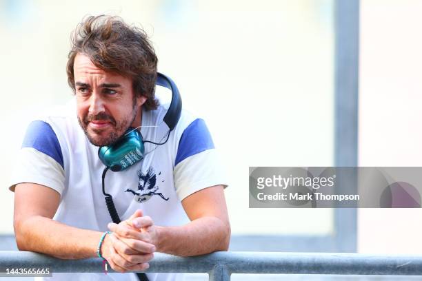 Fernando Alonso of Spain and Aston Martin F1 Team looks on from the pit wall during Formula 1 testing at Yas Marina Circuit on November 22, 2022 in...