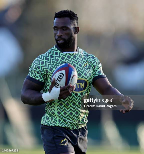 Siya Kolisi looks on during the South Africa Springboks training session held at The Lensbury on November 22, 2022 in Teddington, England.