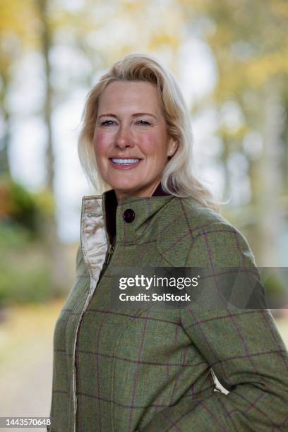 a british portrait - woman jacket stock pictures, royalty-free photos & images