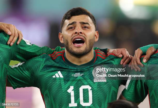 Alexis Vega of Mexico sings their national anthem prior to the FIFA World Cup Qatar 2022 Group C match between Mexico and Poland at Stadium 974 on...