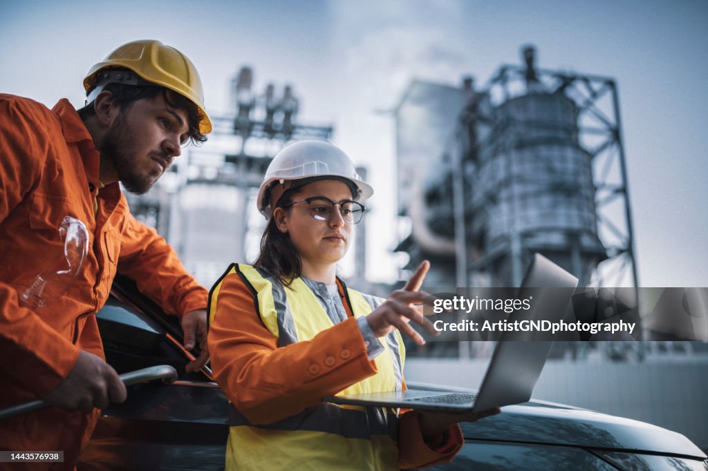 Team of engineers working on a night shift.
