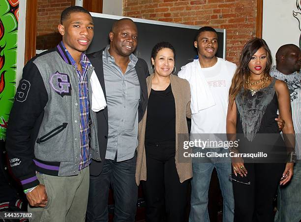 Rapper Eve poses with family members brother Sherman Wilch, stepfather Ron Wilch, mother Julie Wilch and brother Farrod Wilch in the VIP room at Kung...