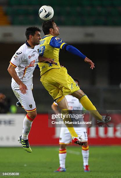 Davide Brivio of US Lecce competes for the ball Gennaro Sardo of AC Chievo Verona during the Serie A match between AC Chievo Verona and US Lecce at...