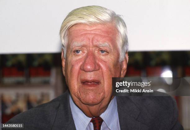 Close-up of former Speaker of the US House of Representatives Thomas Phillip 'Tip' O'Neill signs his autobiography 'Man of the House' at Harvard...