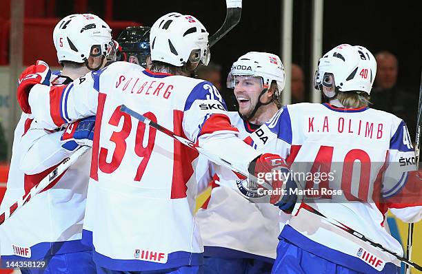 Juha Kaunismaki of Norway celebrate during the IIHF World Championship group S match between Germany and Norway at Ericsson Globe on May 13, 2012 in...