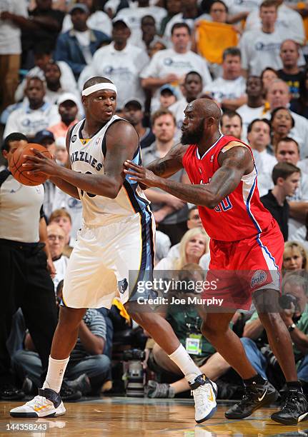 Zach Randolph of the Memphis Grizzlies controls the ball against Reggie Evans of the Los Angeles Clippers in Game Seven of the Western Conference...