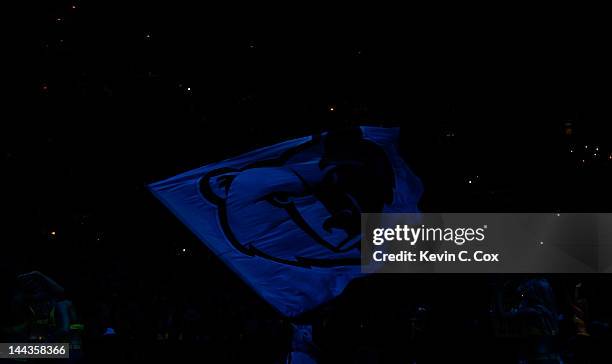 The Memphis Grizzlies mascot waves a giant flag prior to Game Seven of the Western Conference Quarterfinals in the 2012 NBA Playoffs between the...