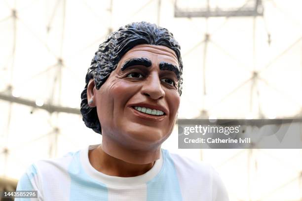 Fan of Argentina wearing a Maradona mask prior to the FIFA World Cup Qatar 2022 Group C match between Argentina and Saudi Arabia at Lusail Stadium on...