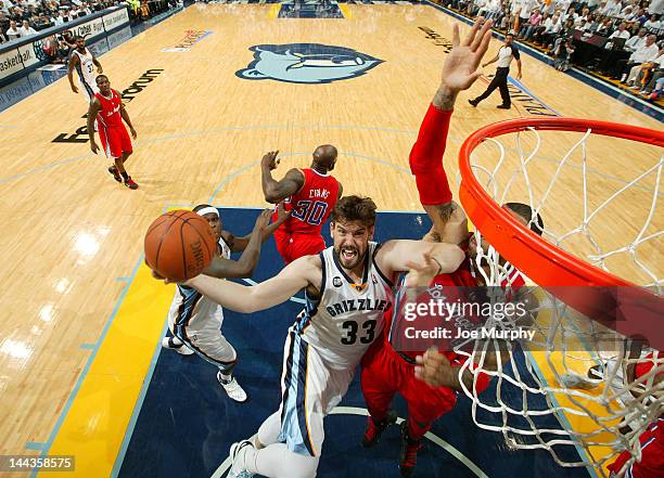 Marc Gasol of the Memphis Grizzlies goes to the basket against Kenyon Martin of the Los Angeles Clippers in Game Seven of the Western Conference...