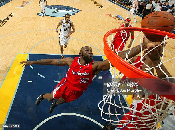 Reggie Evans of the Los Angeles Clippers grabs a rebound in Game Seven of the Western Conference Quarterfinals against the Memphis Grizzlies during...