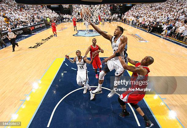 Rudy Gay of the Memphis Grizzlies attempts a layup against Caron Butler of the Los Angeles Clippers in Game Seven of the Western Conference...