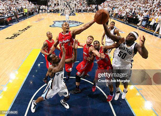 Zach Randolph of the Memphis Grizzlies rebounds against Caron Butler of the Los Angeles Clippers in Game Seven of the Western Conference...