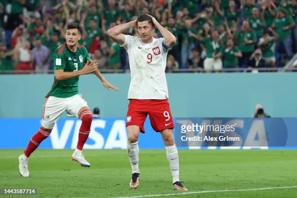 Robert Lewandowski of Poland reacts after their penalty was saved by Guillermo Ochoa of Mexico during the FIFA World Cup Qatar 2022 Group C match...