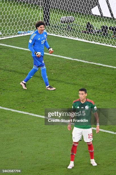 Guillermo Ochoa of Mexico celebrates after saving a penalty from Robert Lewandowski of Poland during the FIFA World Cup Qatar 2022 Group C match...