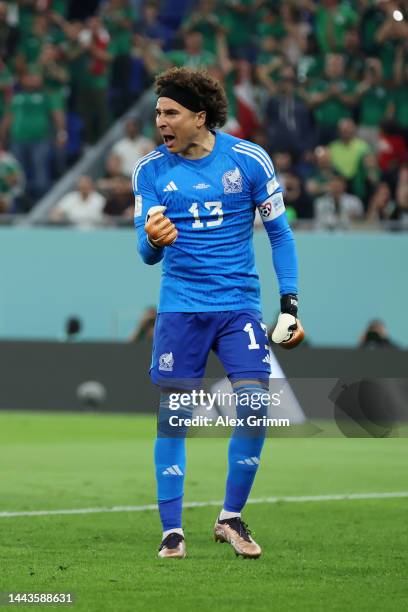 Guillermo Ochoa of Mexico celebrates after saving a penalty from Robert Lewandowski of Poland during the FIFA World Cup Qatar 2022 Group C match...