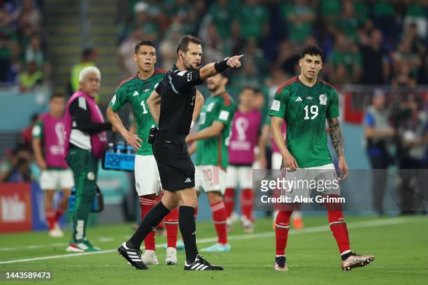 Referee Chris Beath gives a penalty to Poland after a VAR check during the FIFA World Cup Qatar 2022 Group C match between Mexico and Poland at...