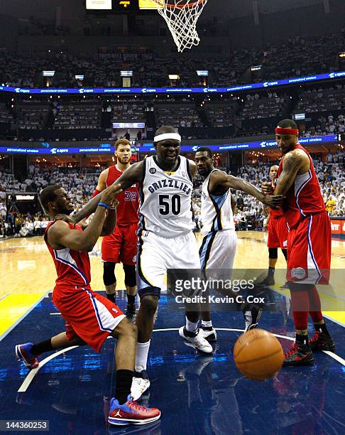 Chris Paul of the Los Angeles Clippers is called for a foul against Zach Randolph of the Memphis Grizzlies in Game Seven of the Western Conference...