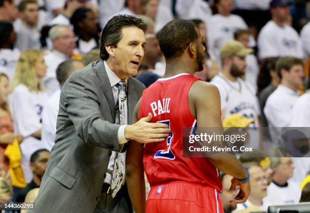 Vinny Del Negro of the Los Angeles Clippers converses with Chris Paul against the Memphis Grizzlies in Game Seven of the Western Conference...