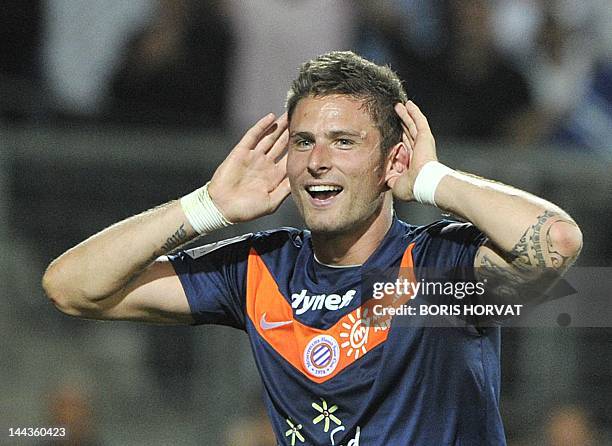 Montpellier's French forward Olivier Giroud celebrates after winning the French L1 football match Montpellier vs Lille on May 13, 2012 at the Mosson...