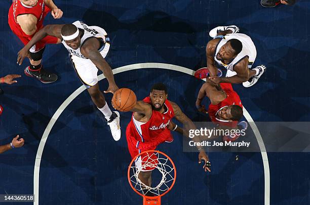 DeAndre Jordan of the Los Angeles Clippers grabs a rebound against Zach Randolph of the Memphis Grizzlies in Game Seven of the Western Conference...
