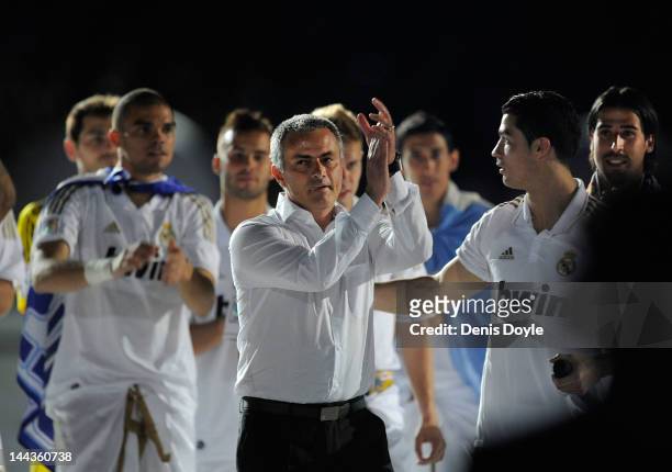 Real Madrid CF head coach Jose Mourinho celebrates the La Liga title with Cristiano Ronaldo after the La Liga match between Real Madrid CF and RCD...