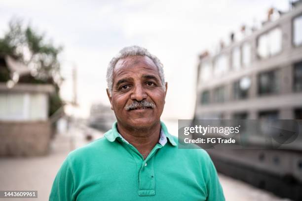portrait of a mature man outdoors - north africa stock pictures, royalty-free photos & images