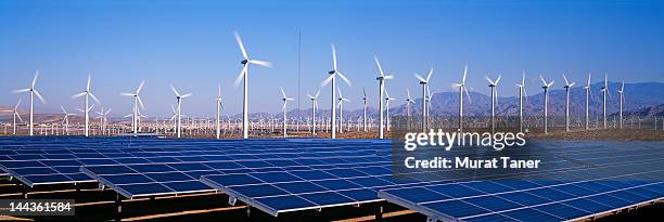 windmills and solar panels, palm springs - wind turbine california stock pictures, royalty-free photos & images